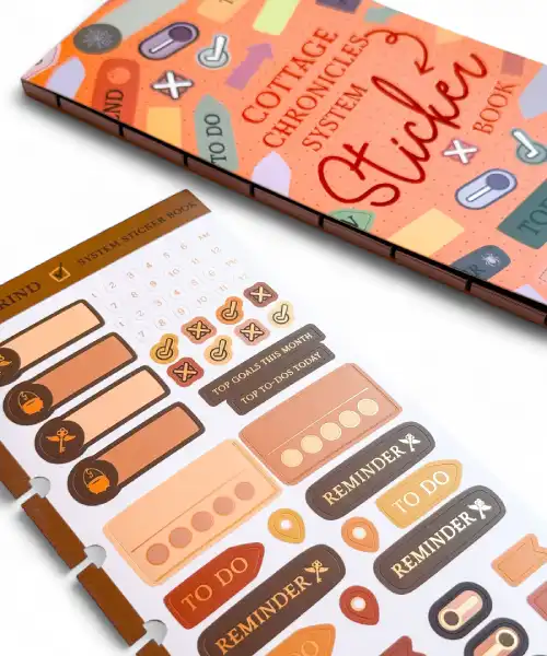 Cottage Chronicles sticker book with various stickers on a white background