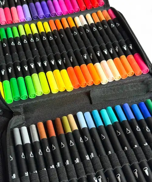 Set of colorful markers in a case on a white background