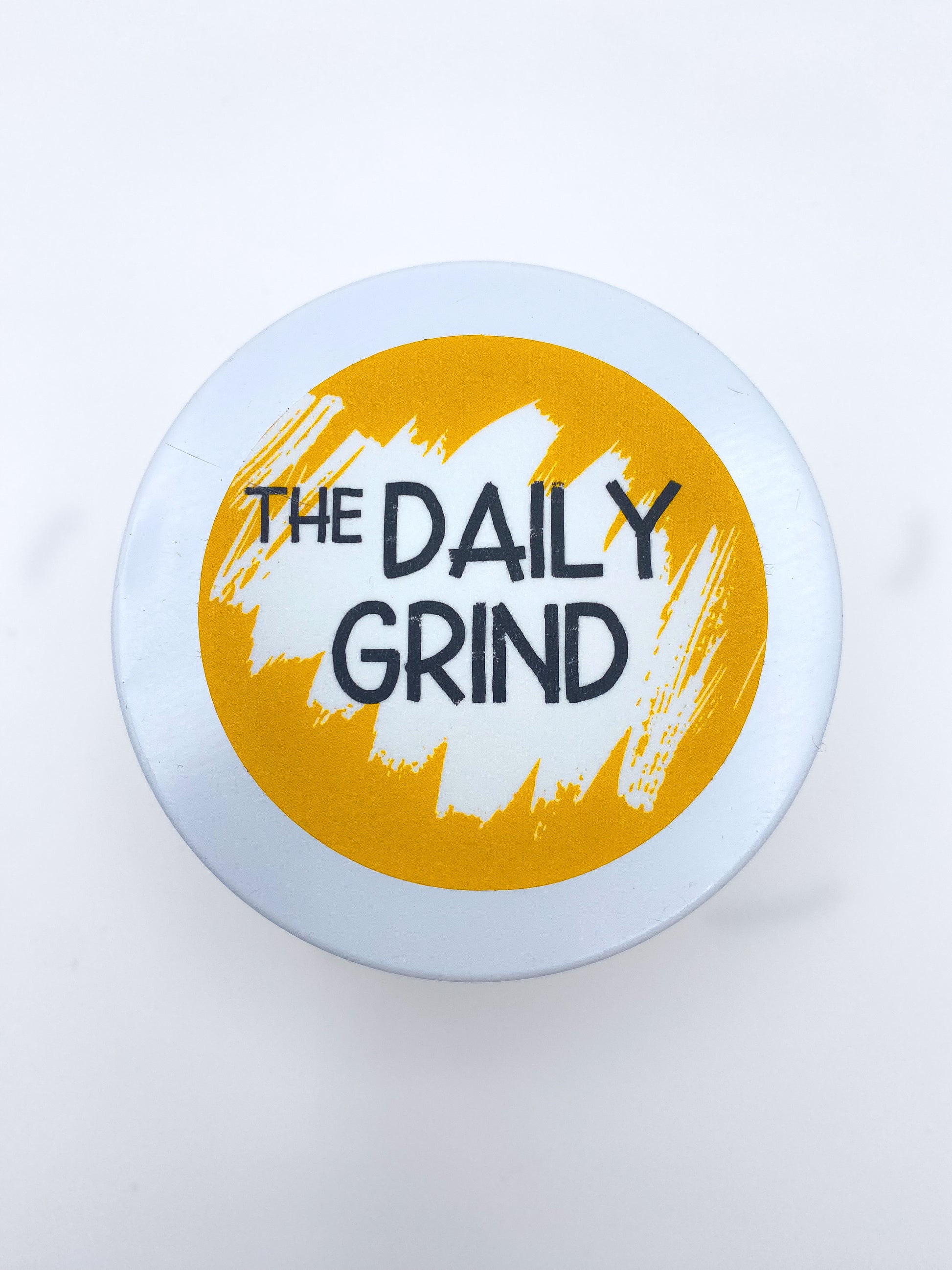 White "The Daily Grind" candle lid