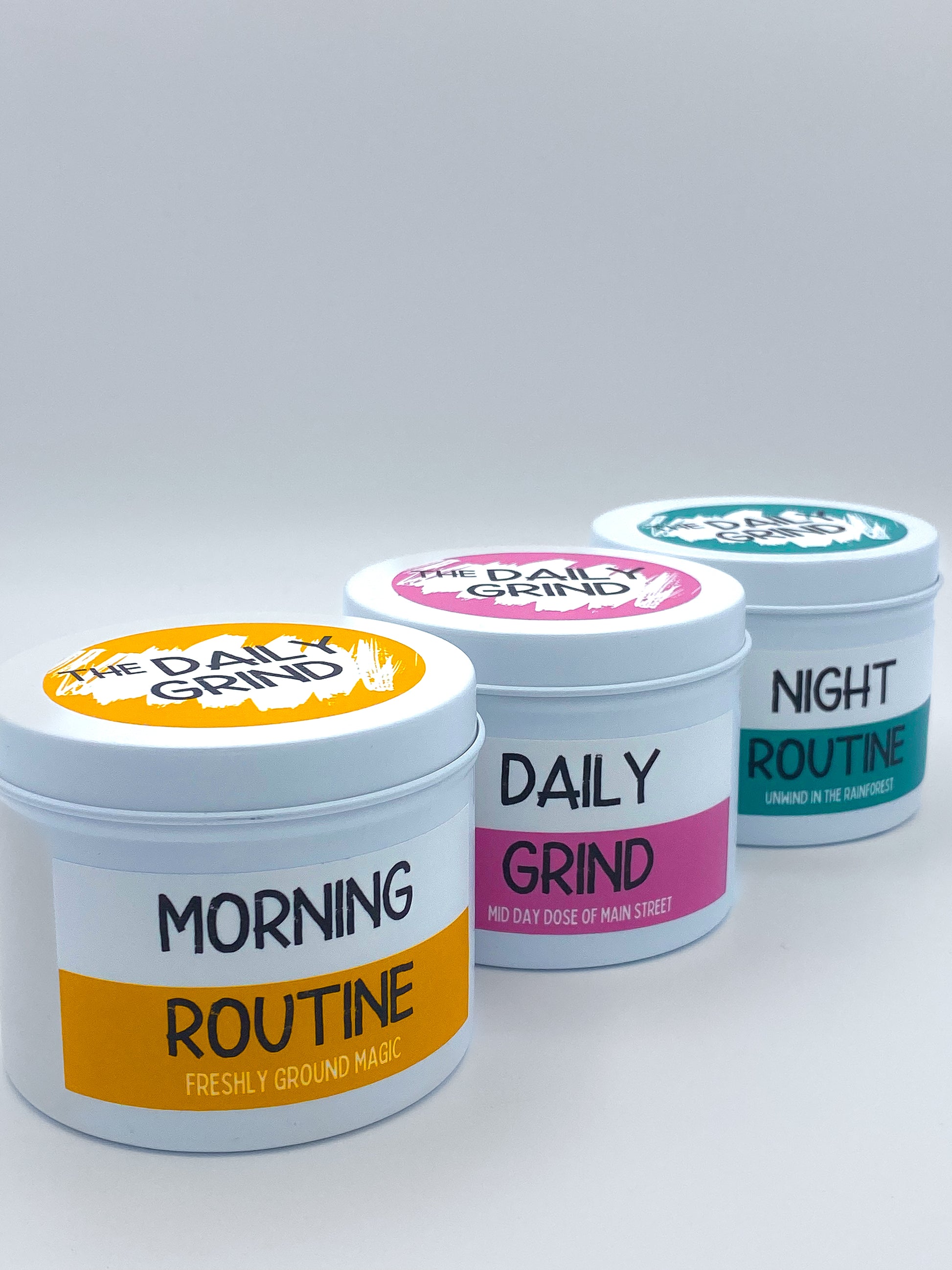 Set of three "routine" candles in white tins with lids