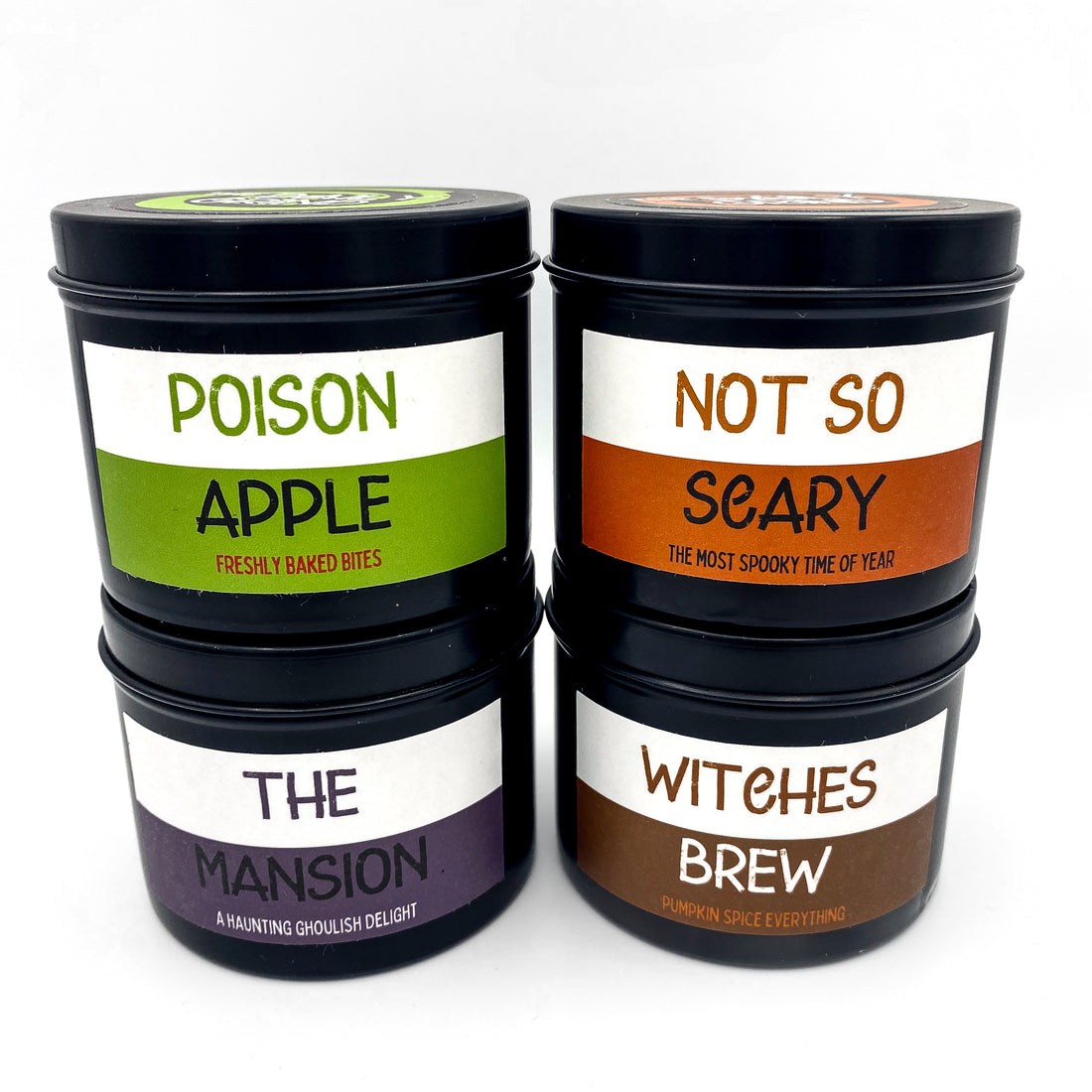 Set of four Halloween candles in black tins