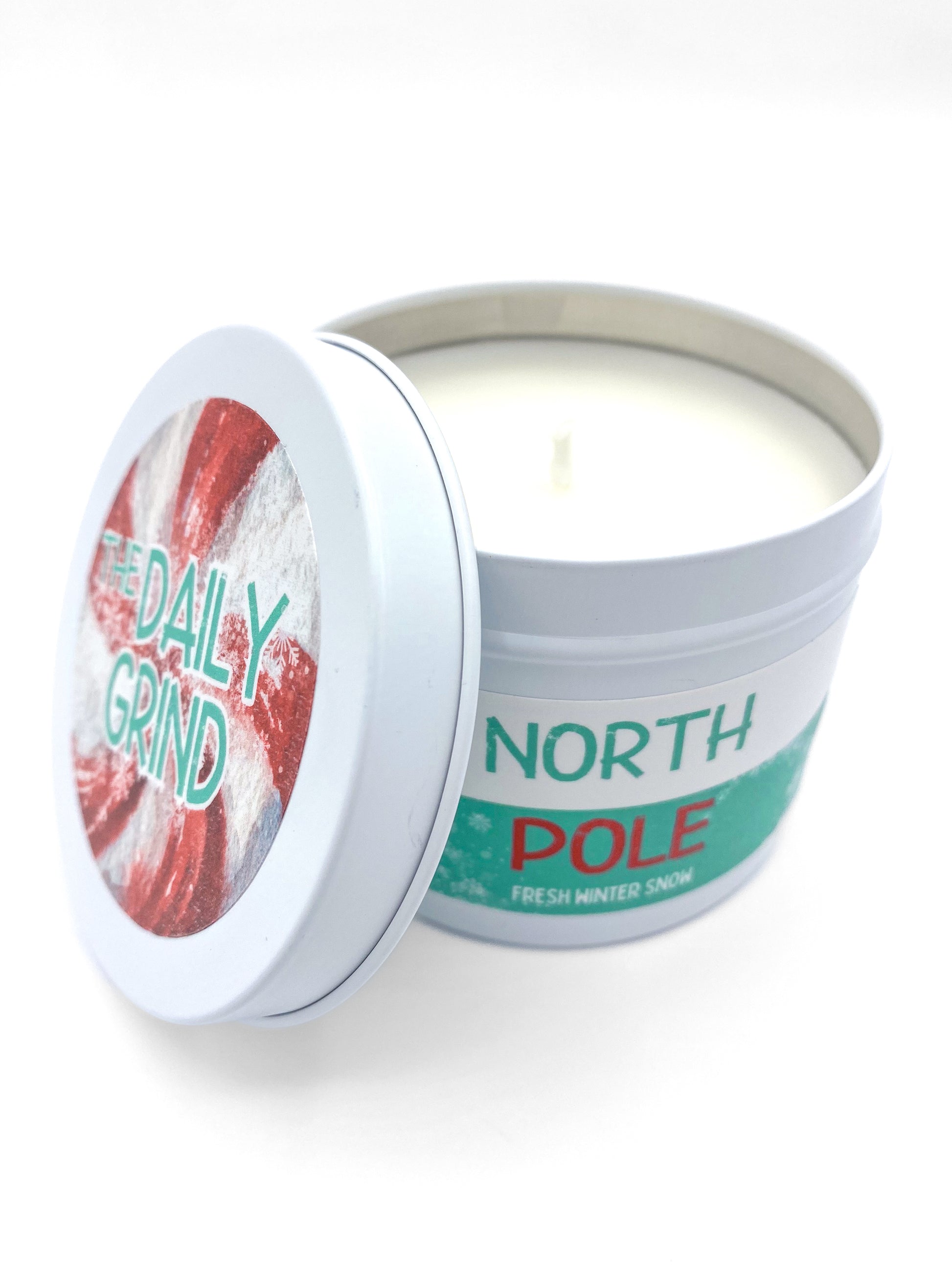 Unlit "North Pole" candle in white tin