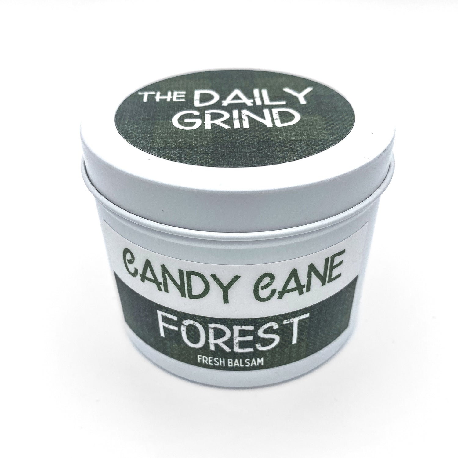 &quot;Candy Cane Forest&quot; holiday candle in decorative white tin