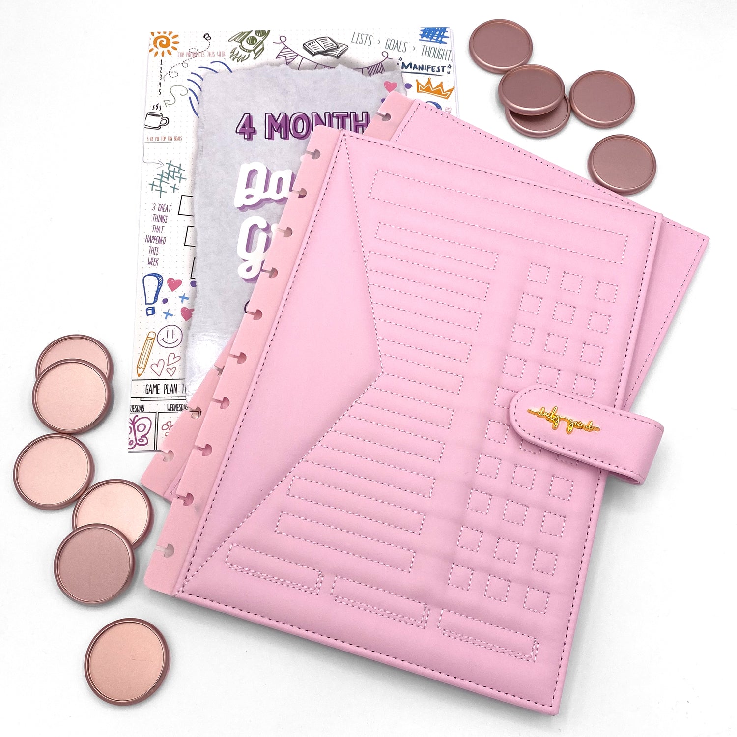 Pink planner cover and discs with &quot;4 Month Daily Grind Sheets&quot; insert