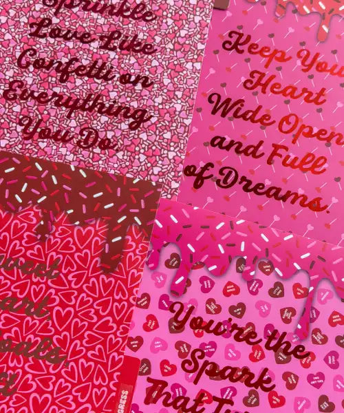 Two pink cards with heart patterns and motivational text.
