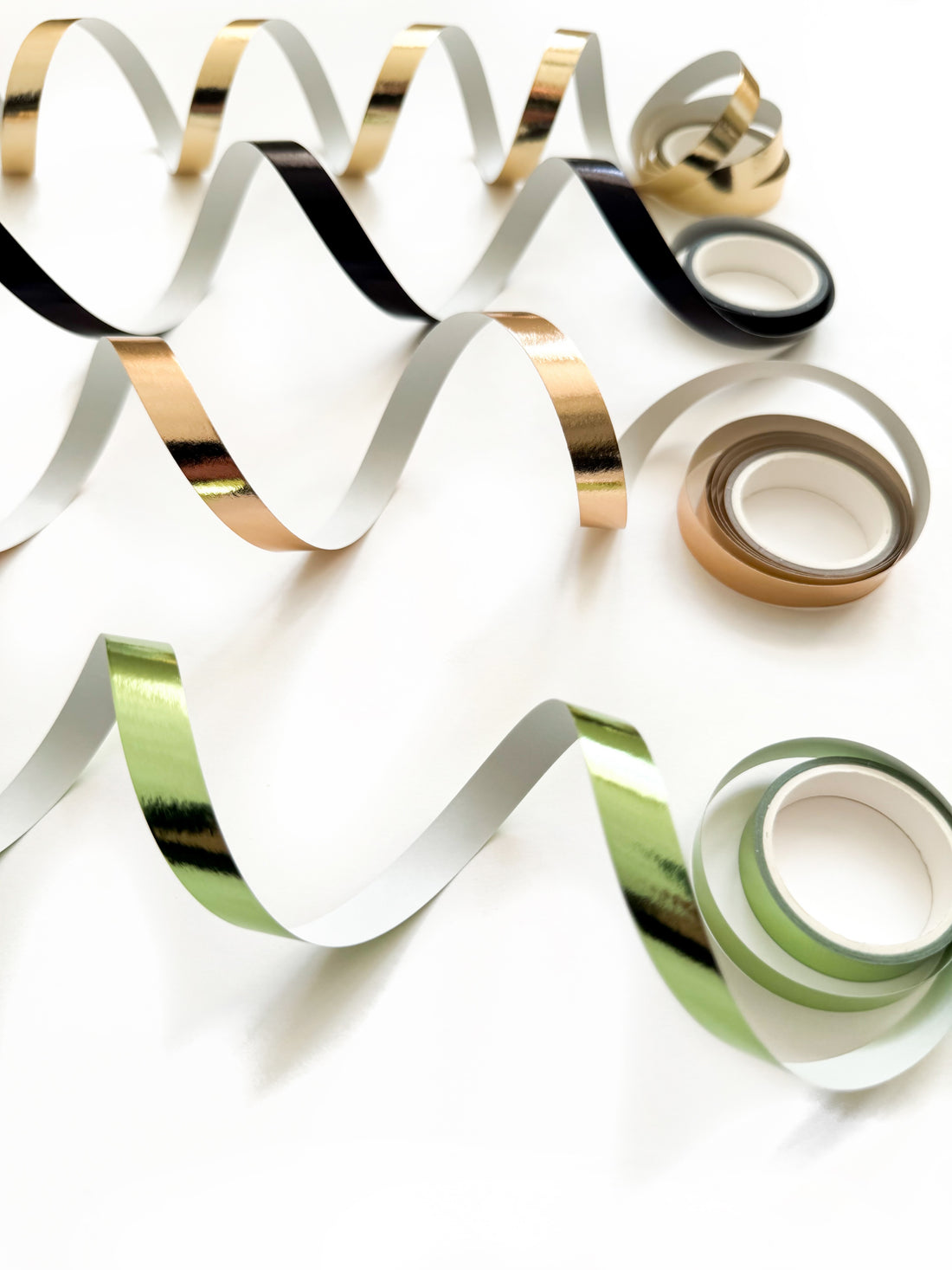Gold, black, rose gold and green washi tape rolls